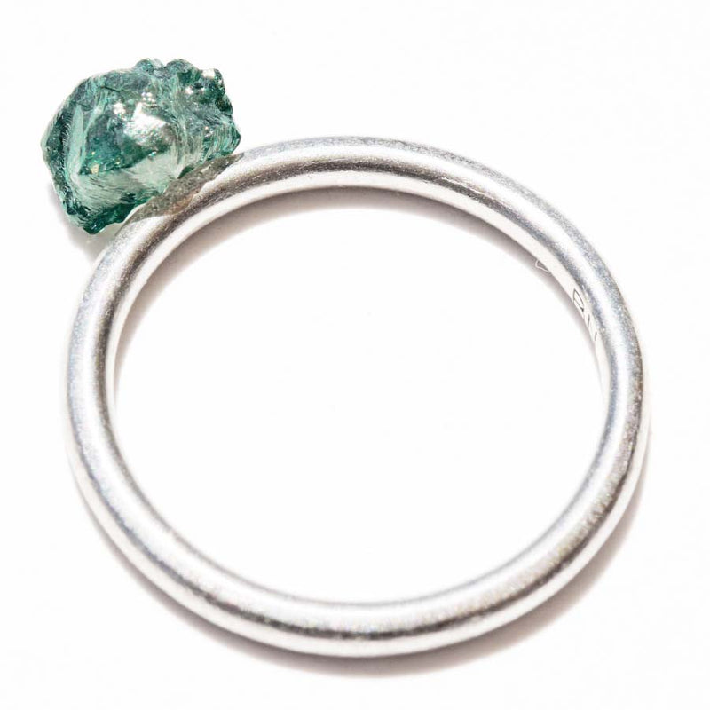 1.25 carat deep sea green freeform shaped rough diamond