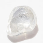 0.72 carat matte white freeform shaped raw diamond