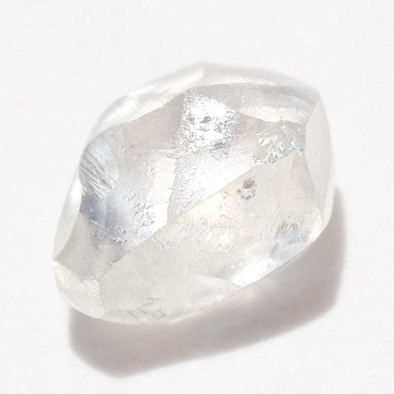 0.72 carat matte white freeform shaped raw diamond