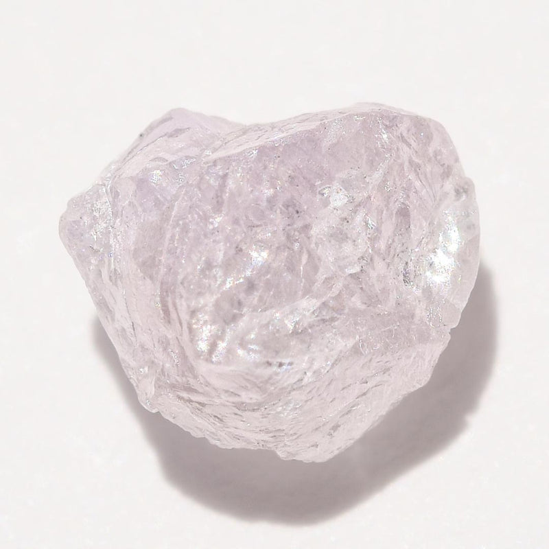 0.98 carat light lilac freeform shaped raw diamond