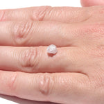 0.98 carat light lilac freeform shaped raw diamond