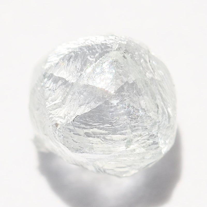 0.93 carat light green raw diamond rhombododecahedron