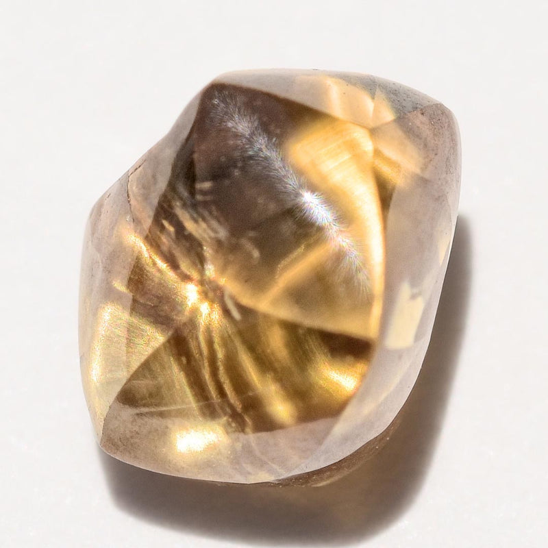 1.32 carat cognac colored rough diamond dodecahedron or maccle
