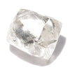 0.52 carat bright white and round rough diamond dodecahedron