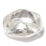 0.52 carat bright white and round rough diamond dodecahedron