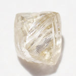 0.72 carat champagne colored rough diamond octahedron