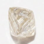 0.72 carat champagne colored rough diamond octahedron