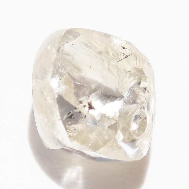 0.73 carat fancy and waterlike raw diamond dodecahedron