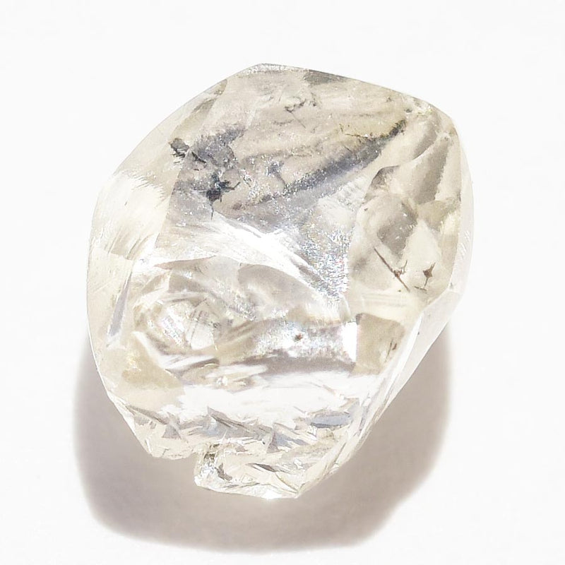 0.73 carat fancy and waterlike raw diamond dodecahedron