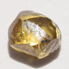 0.67 carat glowy and olive colored freeform rough diamond