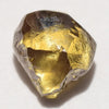 0.67 carat glowy and olive colored freeform rough diamond