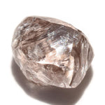 0.79 carat silvery purple freeform rough diamond