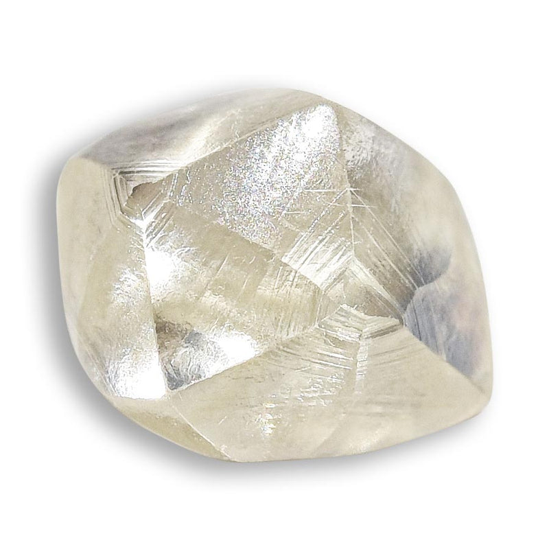0.85 carat light yellow rough diamond dodecahedron