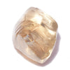 1.25 carat fascinating and light-filled golden brown raw diamond dodecahedron