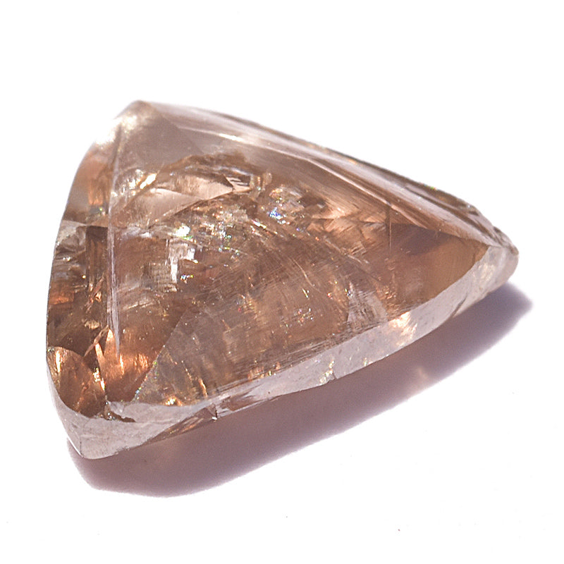 1.21 carat triangular chocolate colored rough diamond