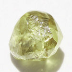 1.40 carat olive green and rounded rough diamond