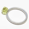 1.40 carat olive green and rounded rough diamond