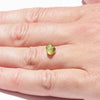 1.40 carat olive green and rounded rough diamond