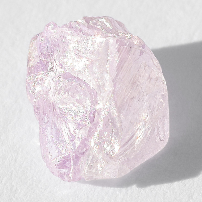 1.09 carat light purple and white raw diamond