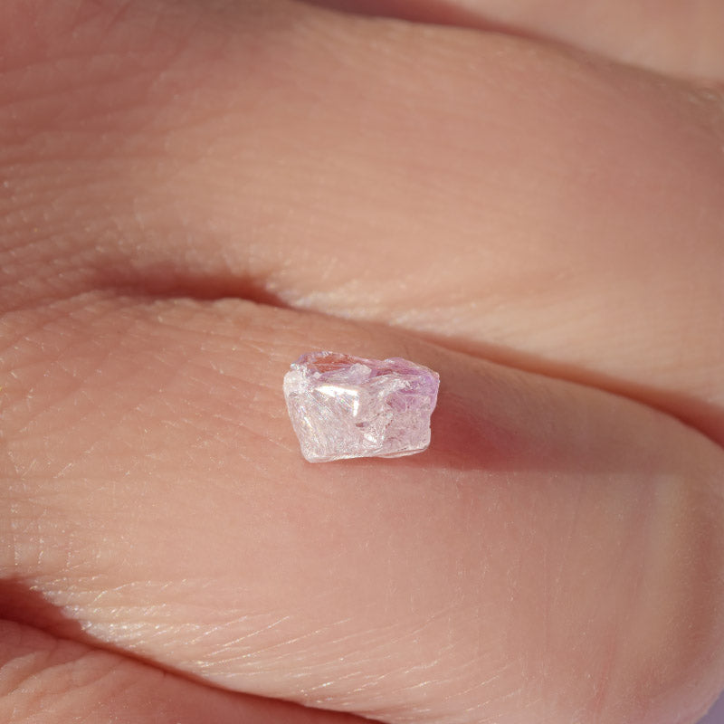 1.09 carat light purple and white raw diamond