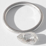 1.59 carat teardrop shaped salt and peppery raw diamond