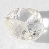 0.96 carat gemmy and waterlike raw diamond dodecahedron