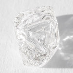 1.54 carat oblong and clear freeform raw diamond