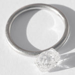 1.54 carat oblong and clear freeform raw diamond