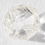 0.68 carat luminous and bright raw diamond octahedron