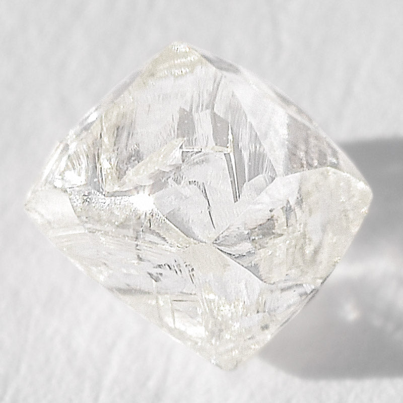 0.68 carat luminous and bright raw diamond octahedron