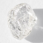 1.07 carat kite-shaped smooth and shiny raw diamond