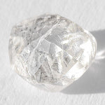 0.91 carat magnificent and animated raw diamond dodecahedron