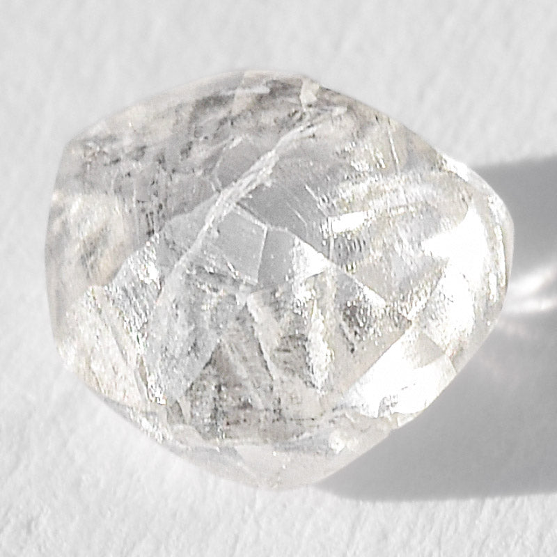 0.91 carat magnificent and animated raw diamond dodecahedron