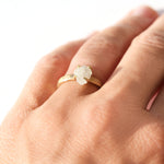 The Midbar Ring - a hammered rough diamond engagement ring with four prongs
