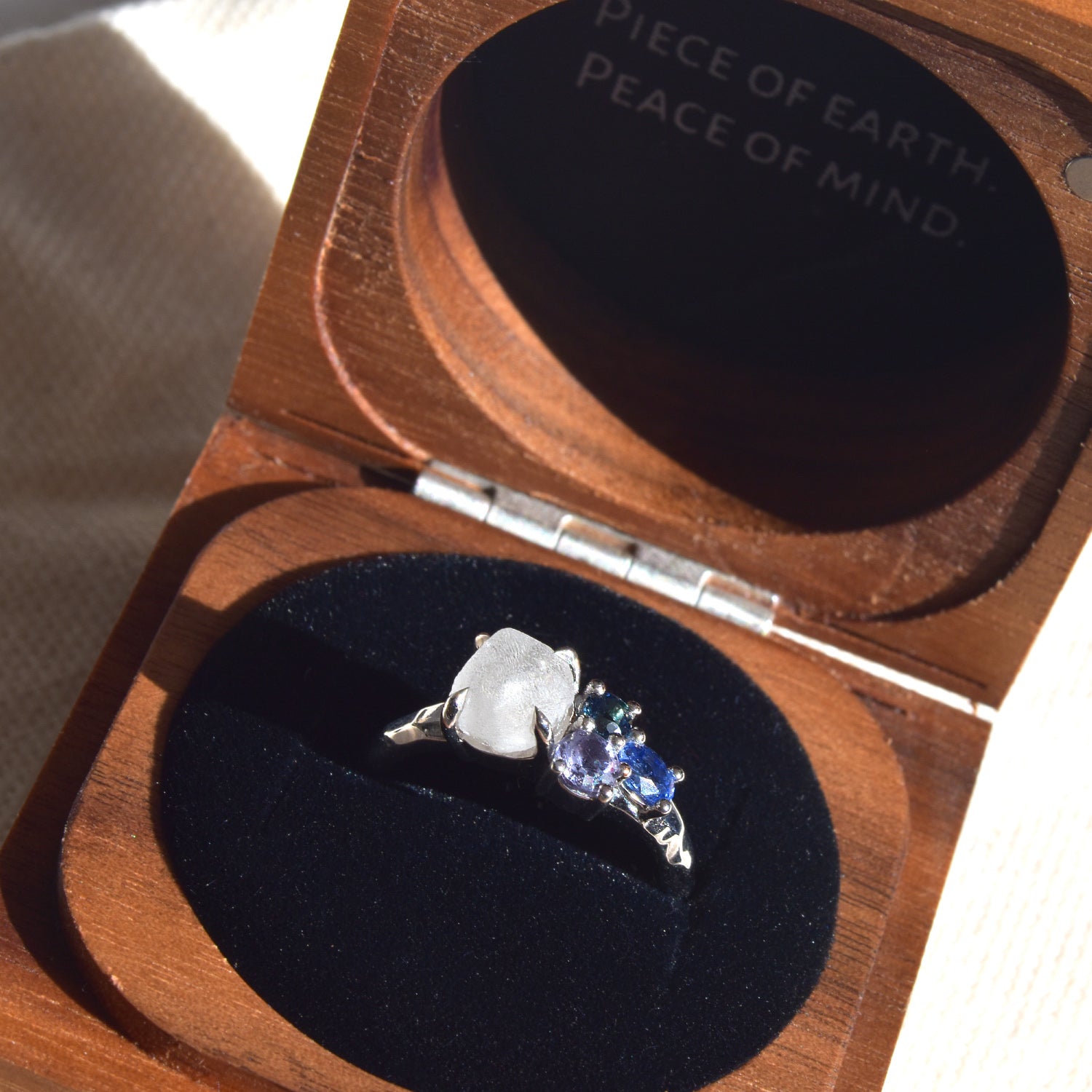 Raziel ring - a customizable rough diamond and sapphire cluster engagement ring