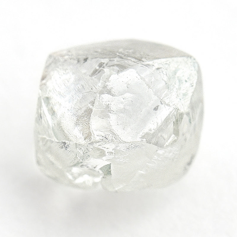 0.91 carat shiny and light filled raw diamond rhombododecahedron