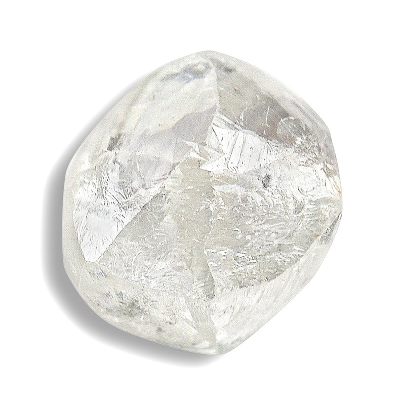 0.91 carat shiny and light filled raw diamond rhombododecahedron