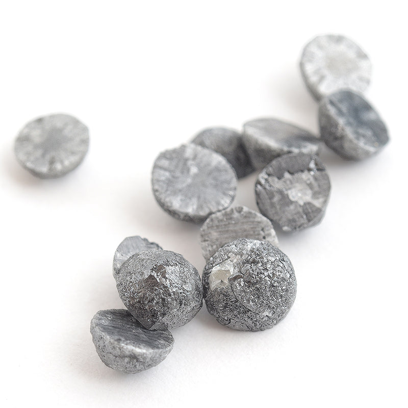 0.50 carat sliced round rough diamonds - black. **We pick one piece from this parcel for you!!**