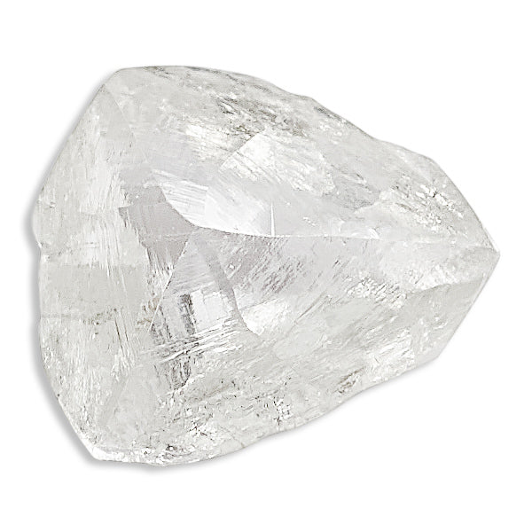 0.53 carat glowy light green raw diamond triangular macle