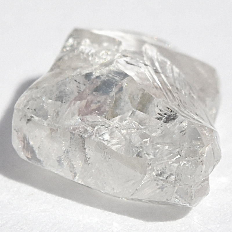 0.99 carat light filled and beautiful flat triangular rough diamond
