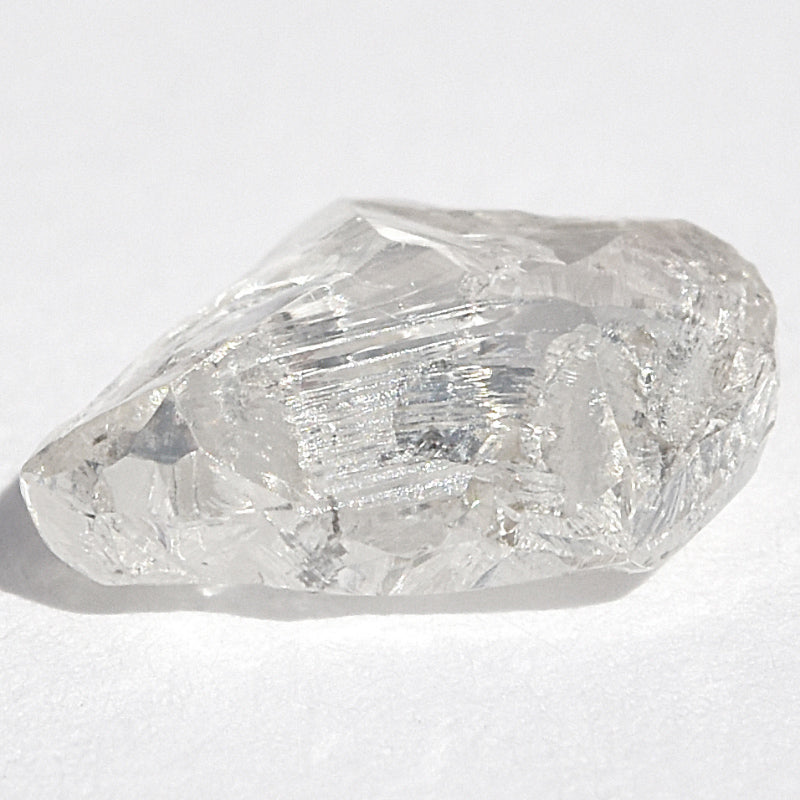 0.99 carat light filled and beautiful flat triangular rough diamond