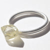2.4 carat bright fancy yellow and very high quality rough diamond dodecahedron