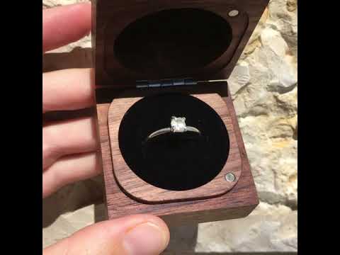 Video of one of our minimalist raw diamond engagement rings in its sustainable wood engagement ring box ready to ship