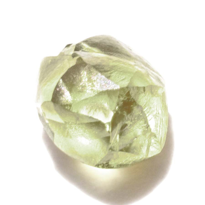 0.78 carat shimmery olive green rough diamond rhombododecahedron