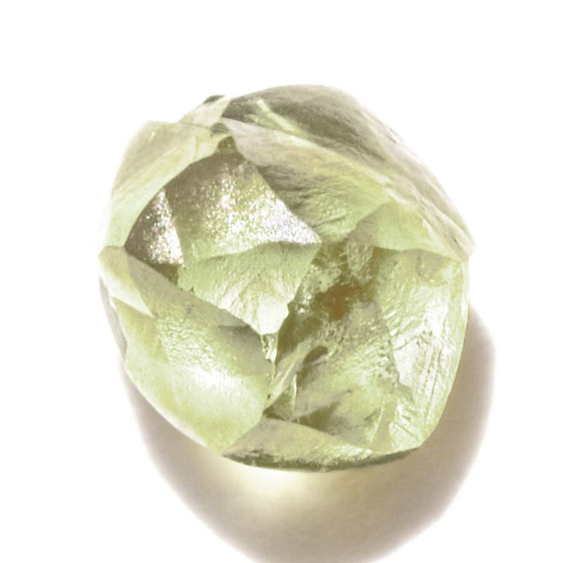 0.78 carat shimmery olive green rough diamond rhombododecahedron