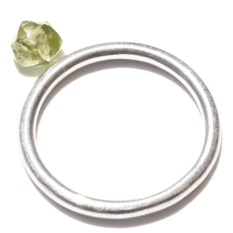 0.78 carat shimmery olive green rough diamond rhombododecahedron