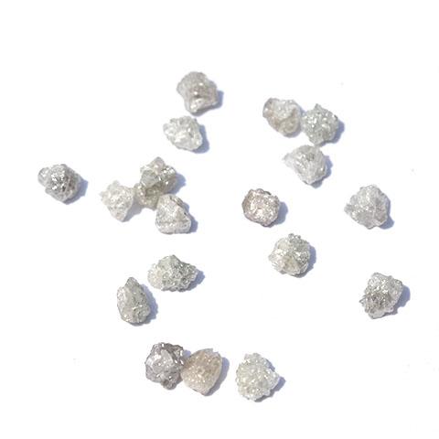 White and silver natural rough diamonds - we pick one piece from this parcel for you - around 0.75 carats each Raw Diamond South Africa 